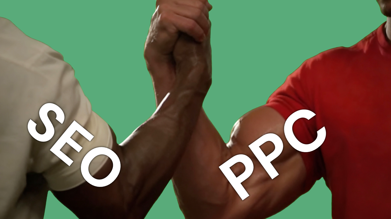 Two ridiculously muscular arms clasping